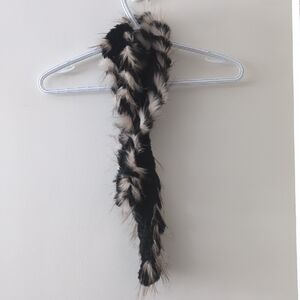 Dino Gaspari rabbit with racoons fur scarf